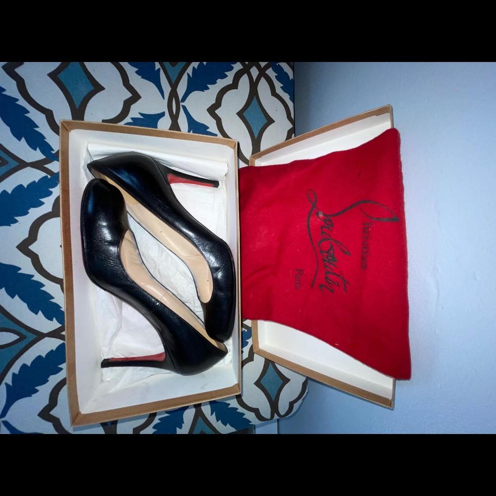 Authentic Louboutin red bottom pumps